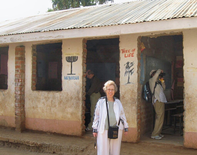 Harriet Bograd in 2011 at a Jewish-themed primary school in Uganda that is open to Christians and Muslims. She was for many years the president of Kulanu, an organization that supports Jewish communities in places where even most American Jews don’t realize there are Jews. Credit…Barbara Vinick, via Kulanu